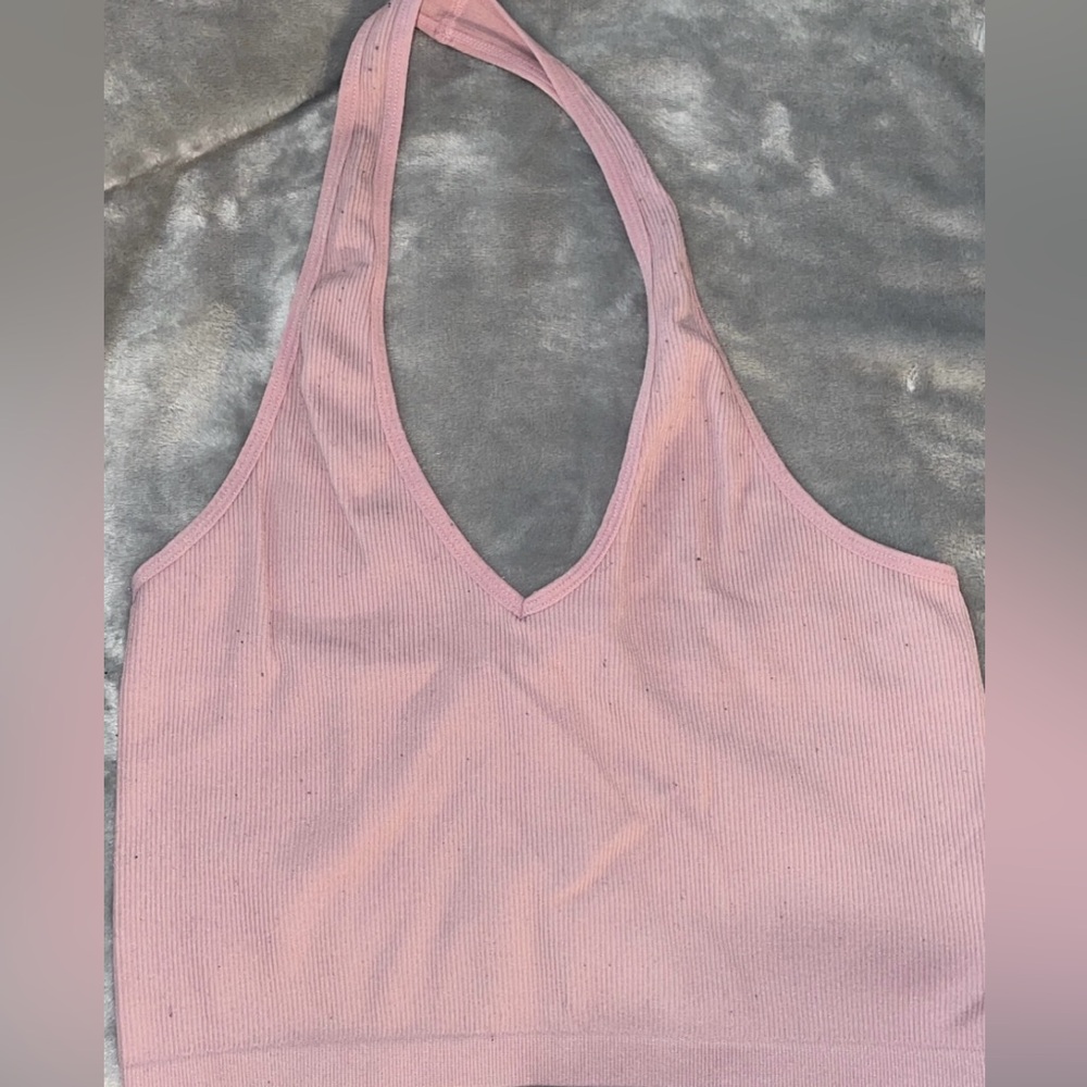 Medium pink top with a couple fuzzies stuck to it